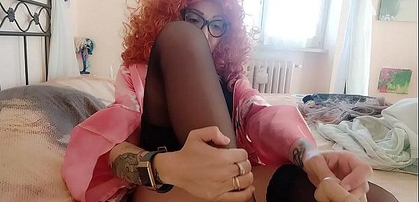  my cousin, the enchanting redhead, shows herself in stockings and plays with the mini penis